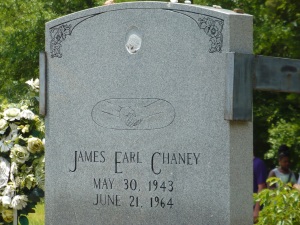 Our last stop was the gravesite of James Chaney. It has been vandalized many times and the headstone was held in place by large black brackets. The picture of Chaney was also shot out. 
